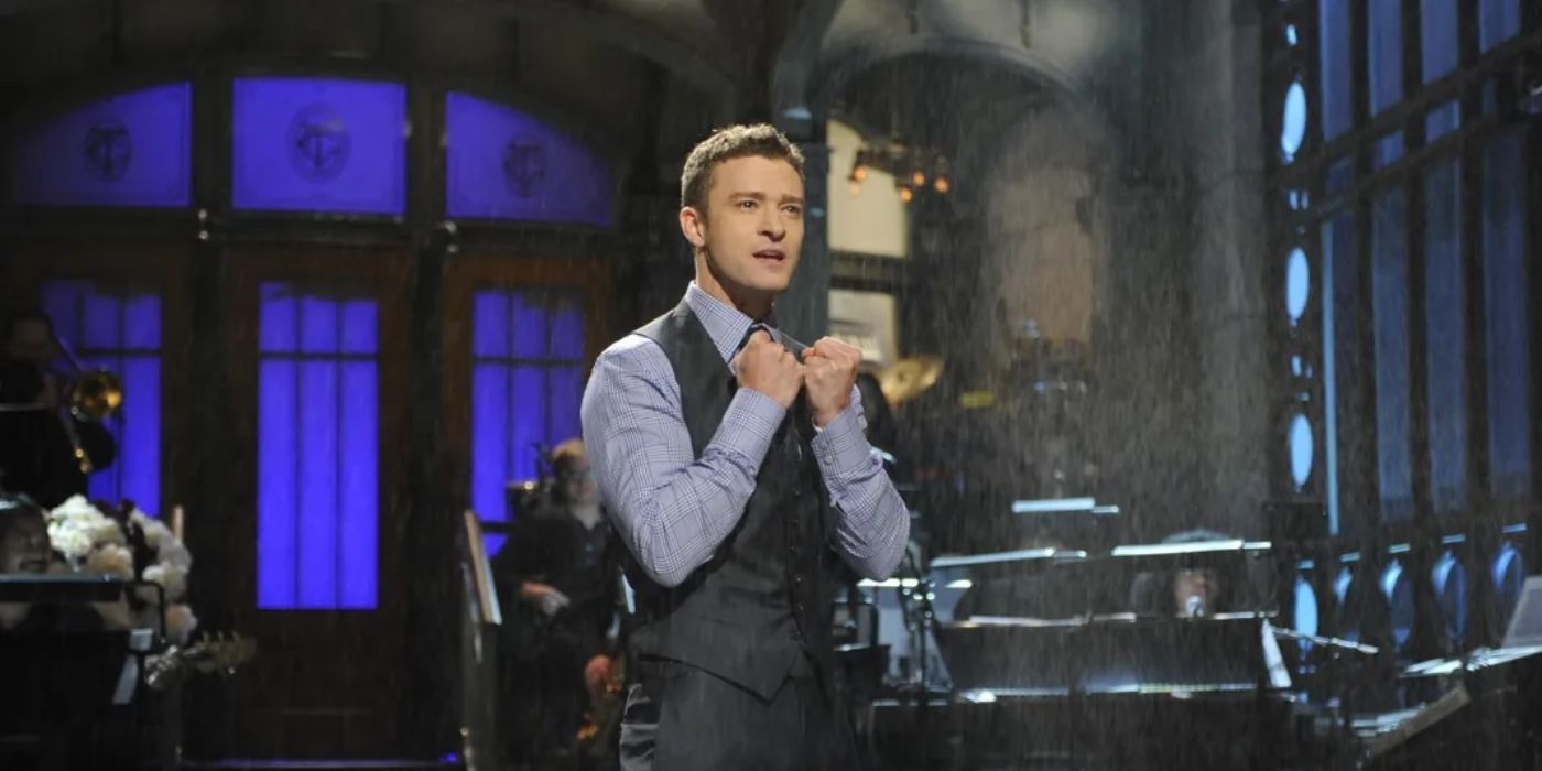 Justin Timberlake stands on stage and performs on Saturday Night Live. 