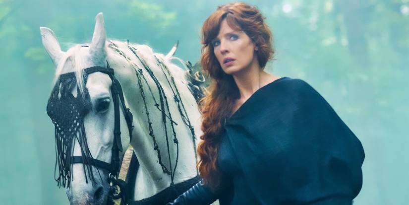 Kelly Reilly next to a white horse in Britannia.