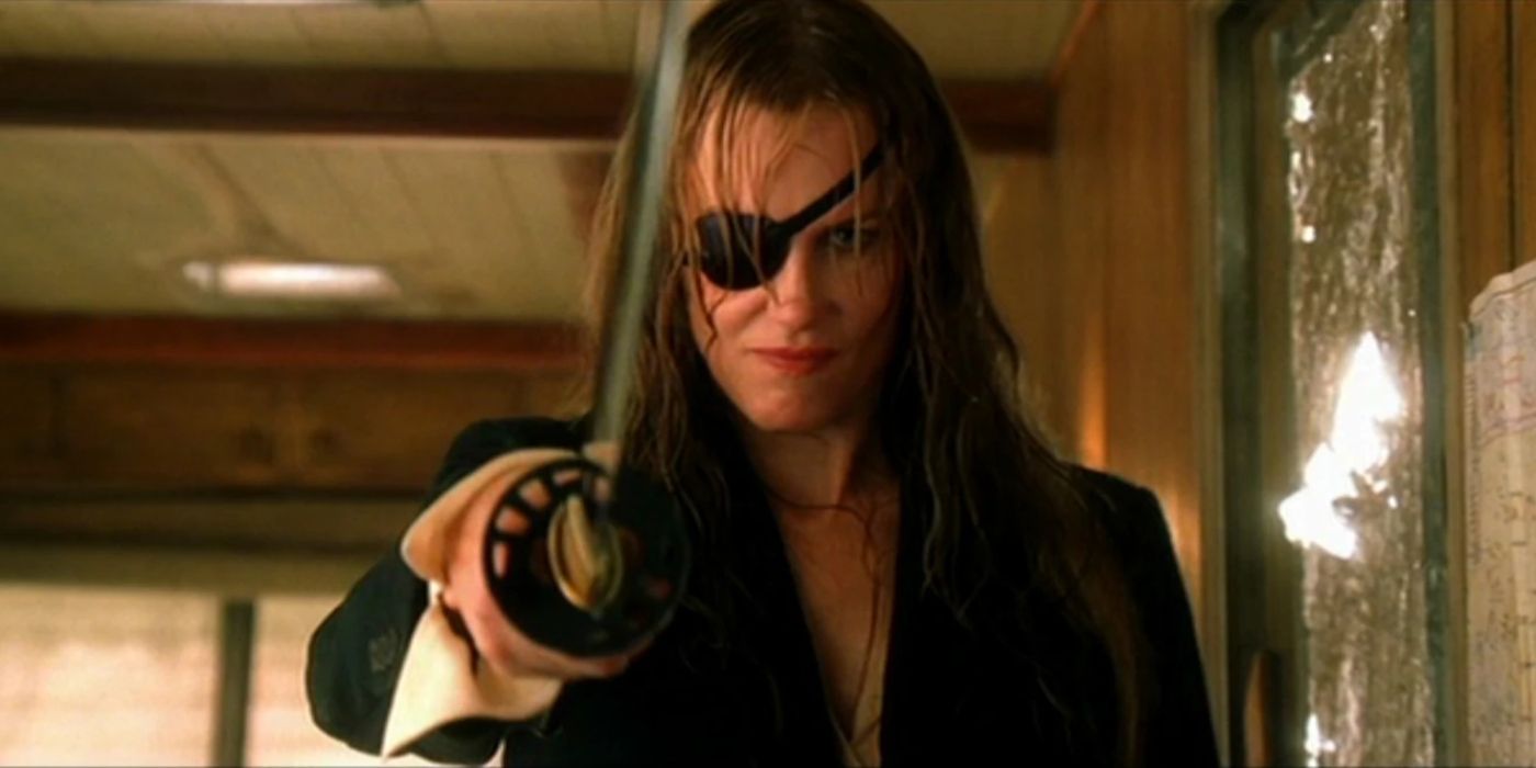 Elle Driver aiming a katana at the camera and smirking in Kill Bill vol. 2