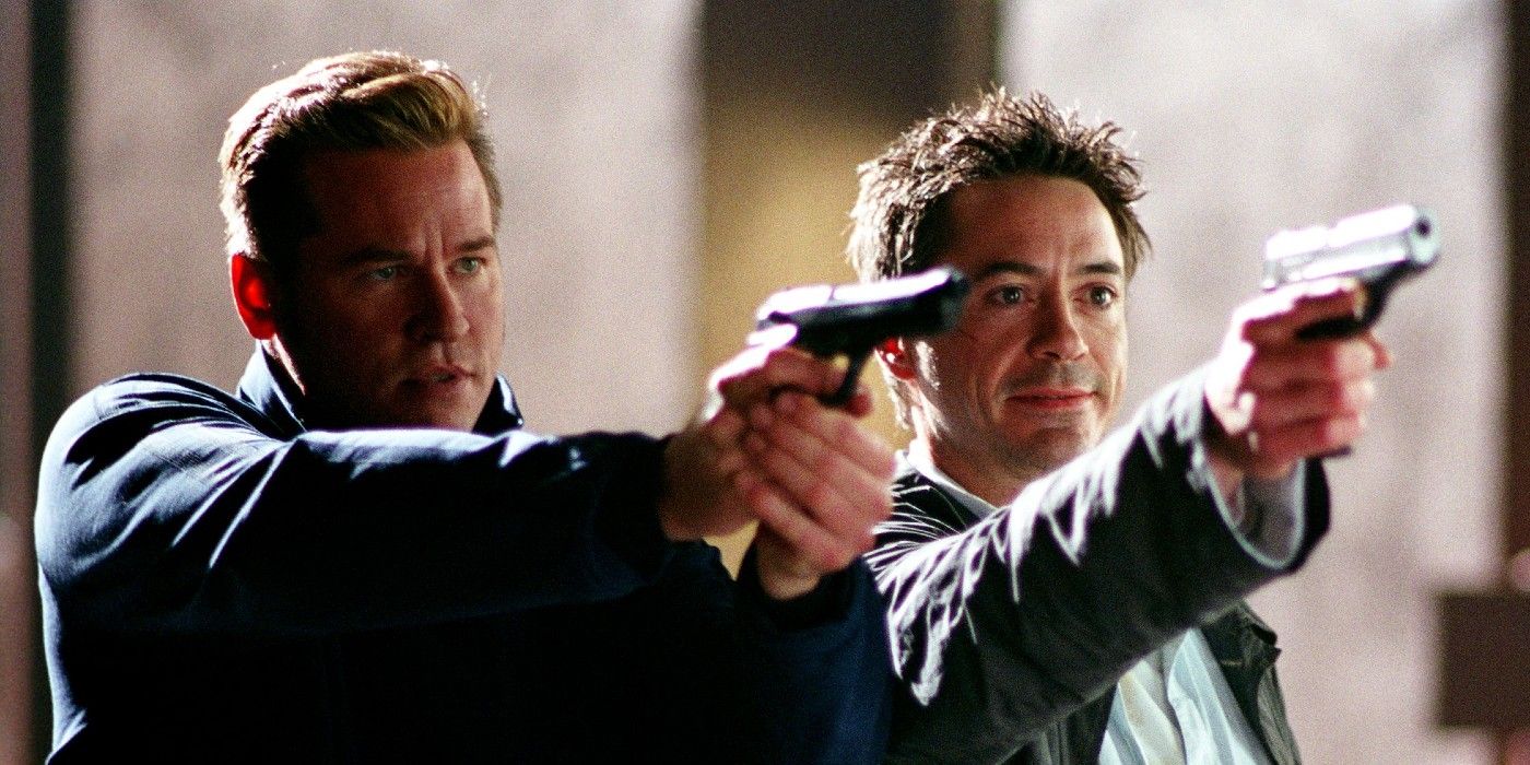 Robert Downey Jr. and Val Kilmer in a shootout scene during 'Kiss Kiss Bang Bang'