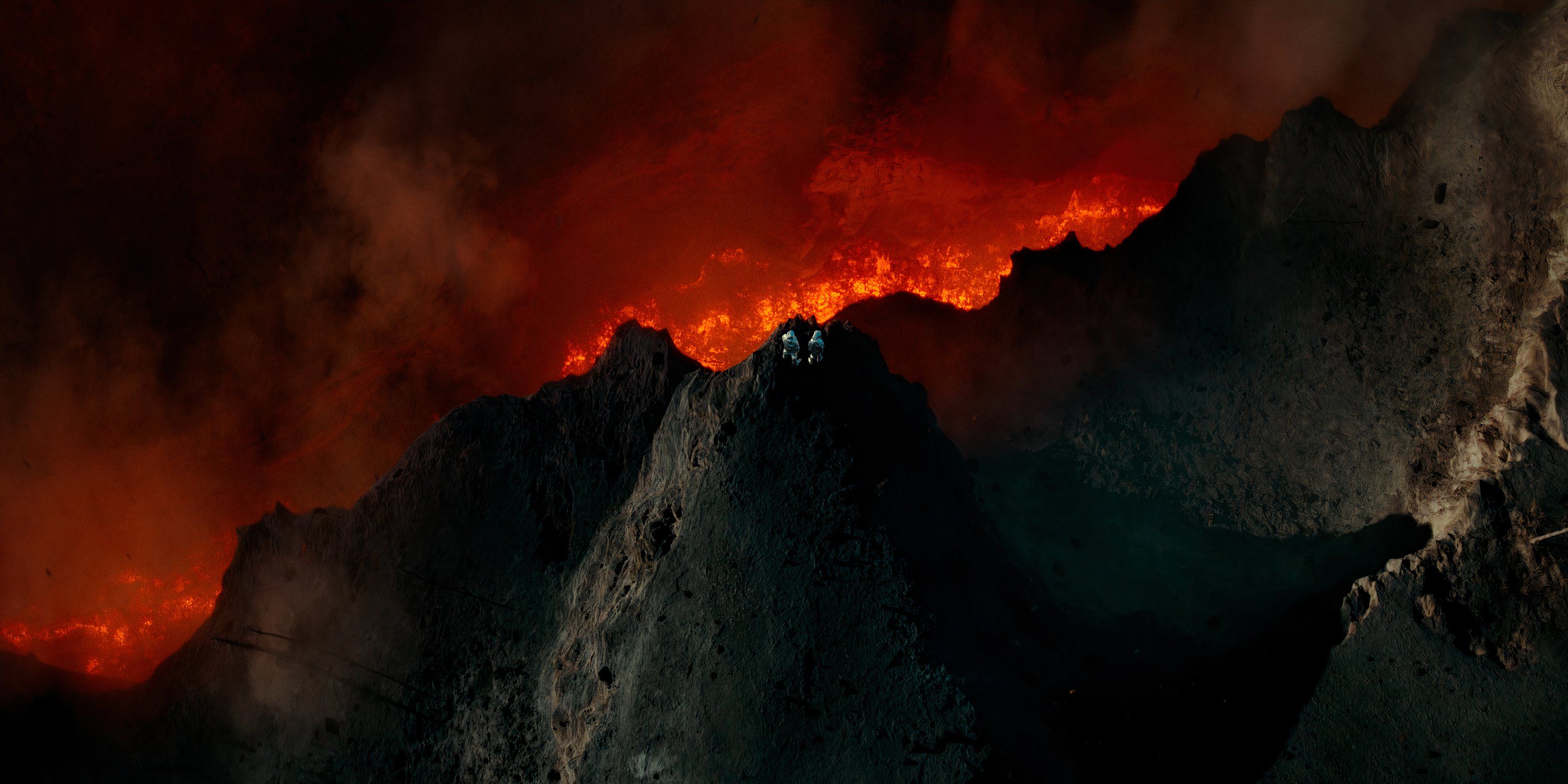 Two scientists watch lava flow through volcano in &lsquo;La Palma.'