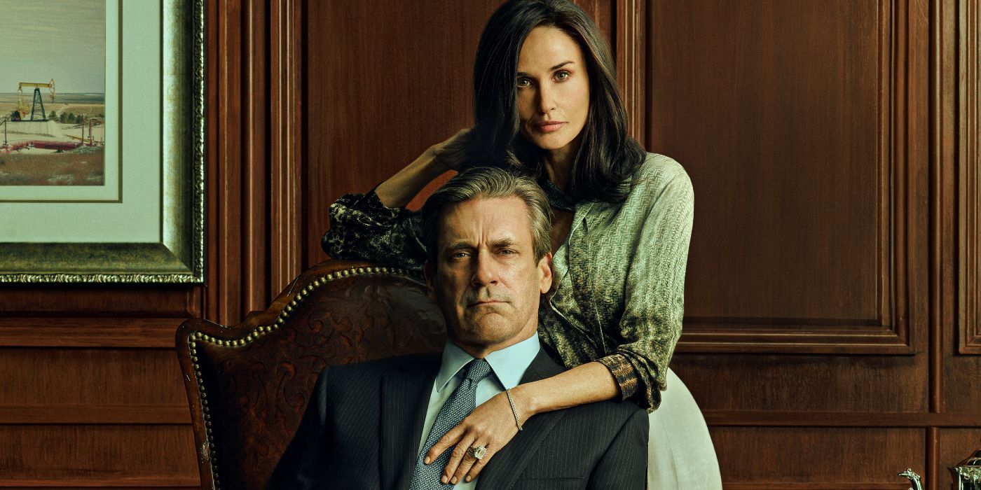 Jon Hamm and Demi Moore posing in an office for Landman