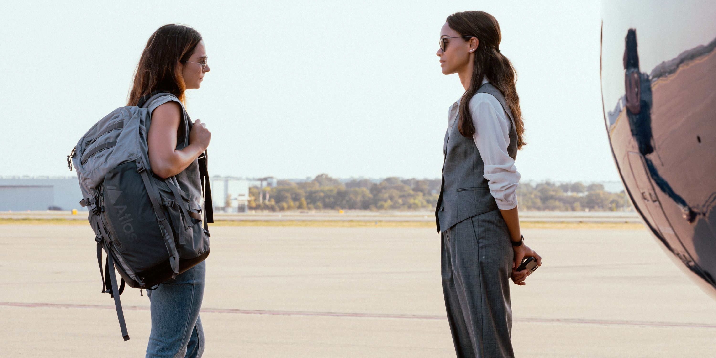 Genesis Rodriguez as Josie and Zoe Saldana as Joe clearly not happy with each other in Season 2 of Lioness