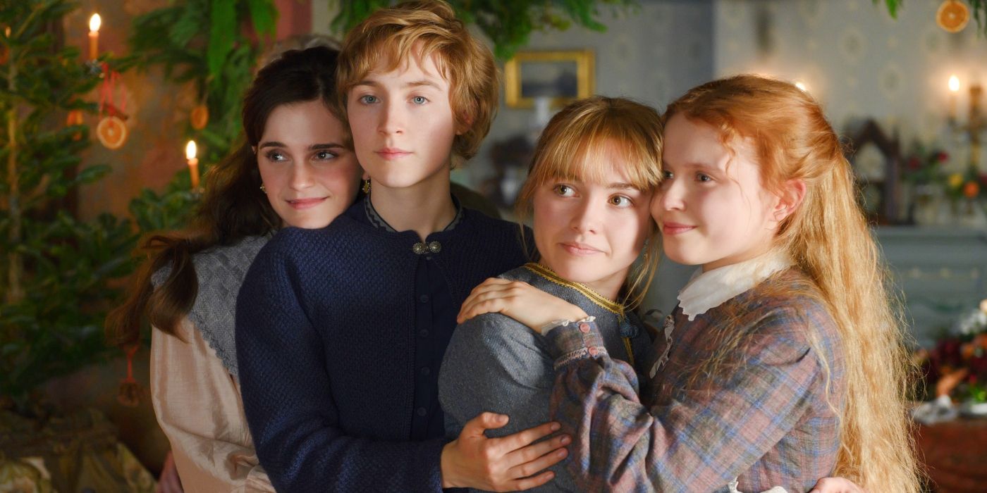 Meg (Emma Watson), Jo (Saoirse Ronan), Amy (Florence Pugh), and Beth (Eliza Scanlen) hugging in Little Women