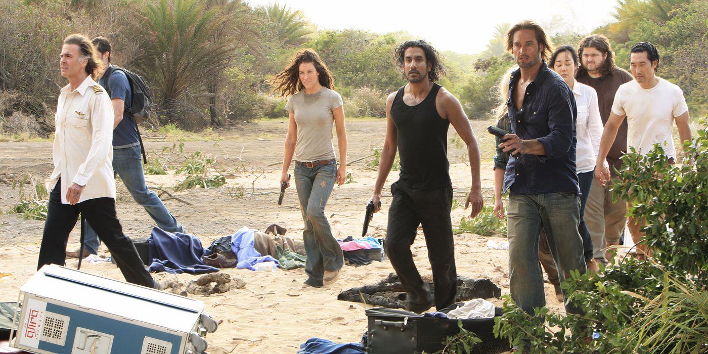 The cast of ABC&rsquo;s Lost walking on the beach with intent.