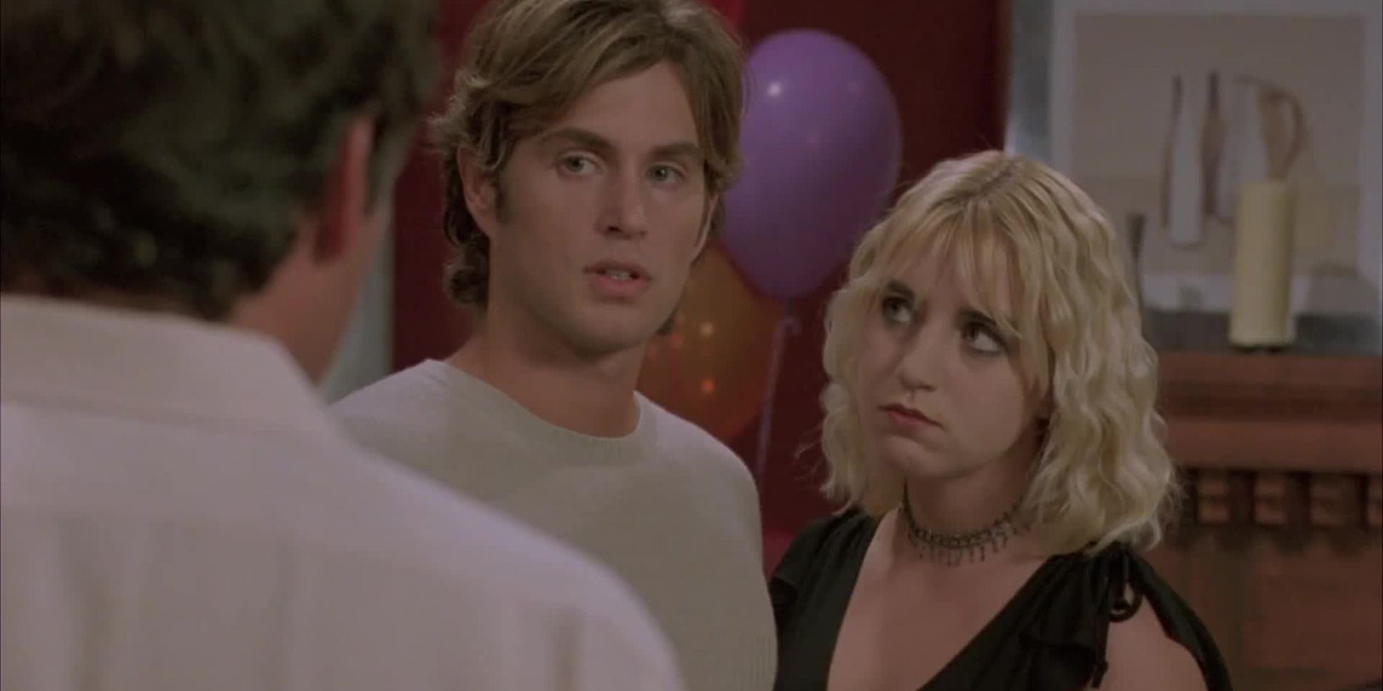 Mark and Lisa in a party in 'The Room' (2003)