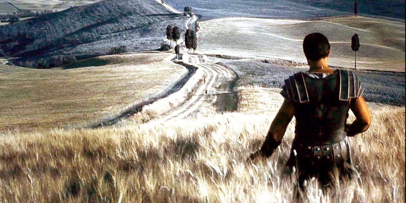Russell Crowe as Maximus walking through a wheat field, touching the wheat, in &lsquo;Gladiator&rsquo;