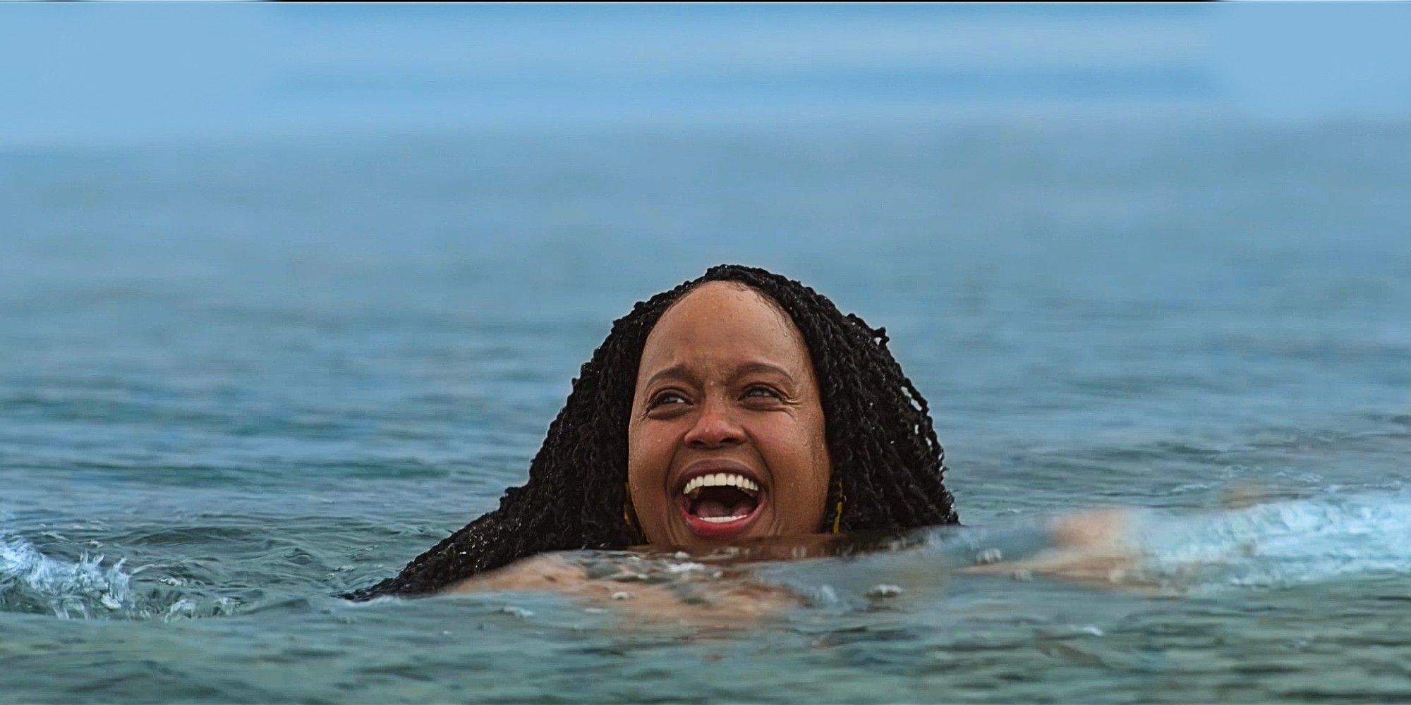 Mel swimming in a lake in How to Die Alone.