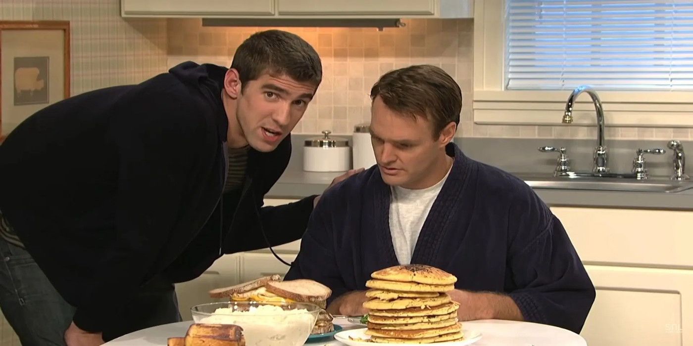 Michael Phelps performs in a sketch with Will Forte in Saturday Night Live