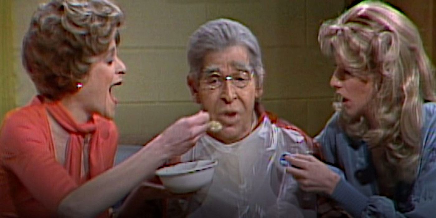 Milton Berle is spoon fed by Gilda Radner and Laraine Newman on Saturday Night Live