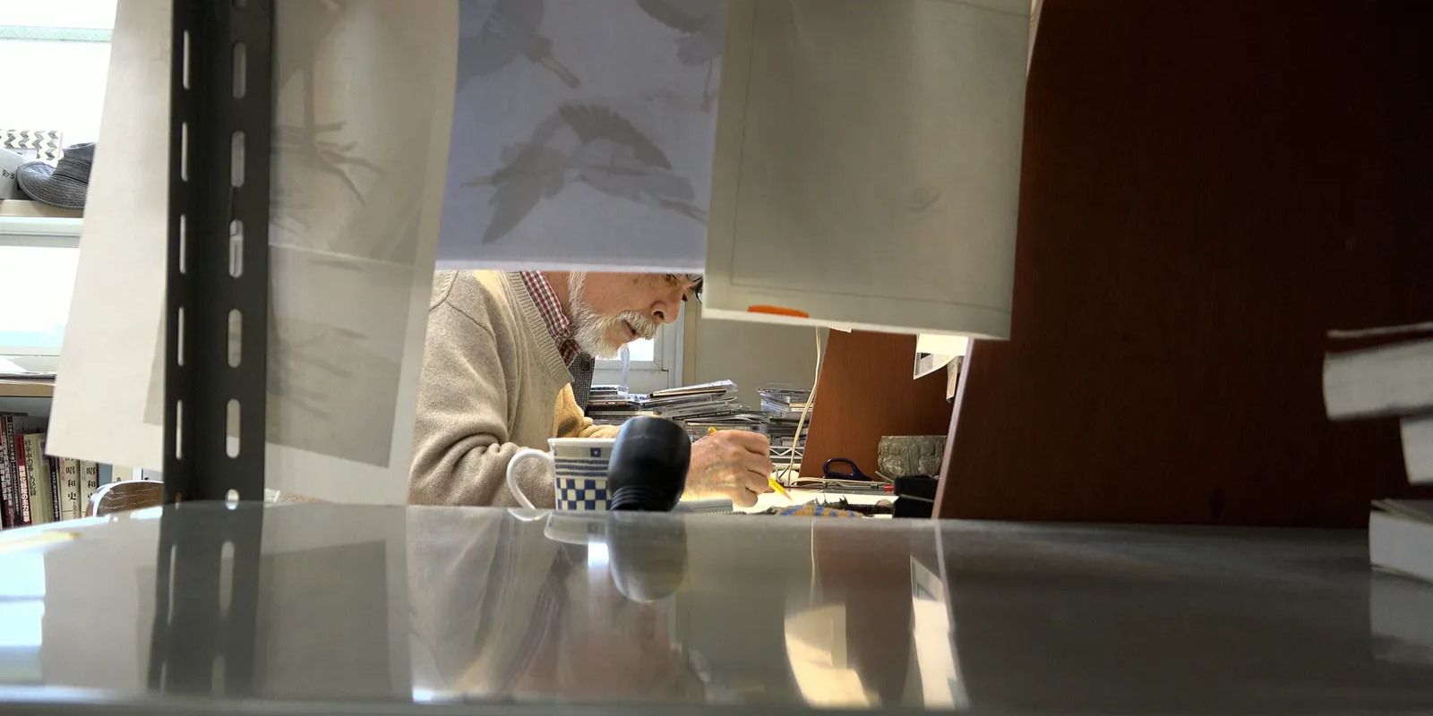 Miyazaki working in &lsquo;Hayao Miyazaki and the Heron&rsquo;