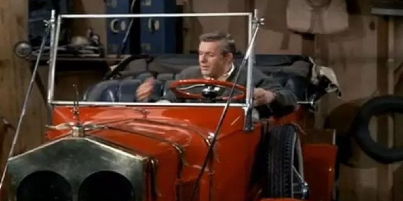 Dave Crabtree sits in a car he believes to be his mother in My Mother the Car