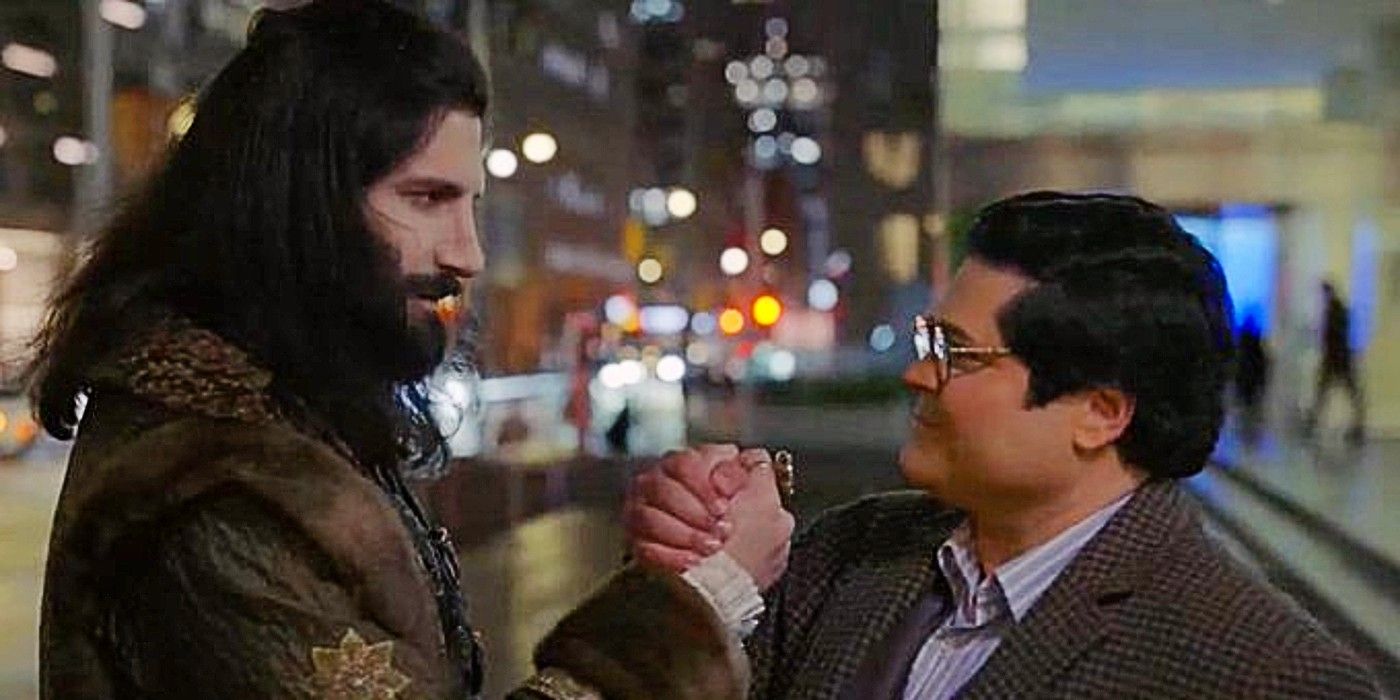 Nandor and Guillermo holding hands in a deal in What We Do in the Shadows Season 6