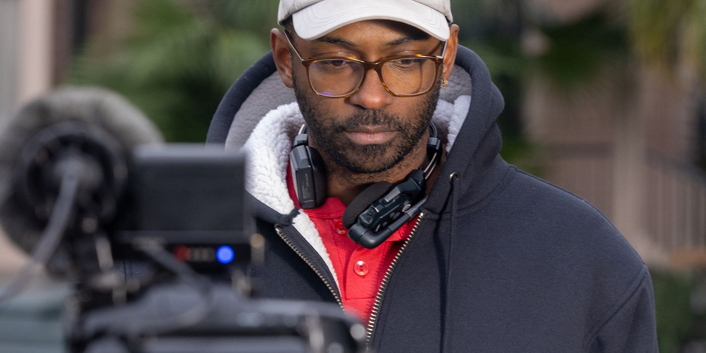 Director RaMell Ross looking at the monitor on the set of Nickel Boys 