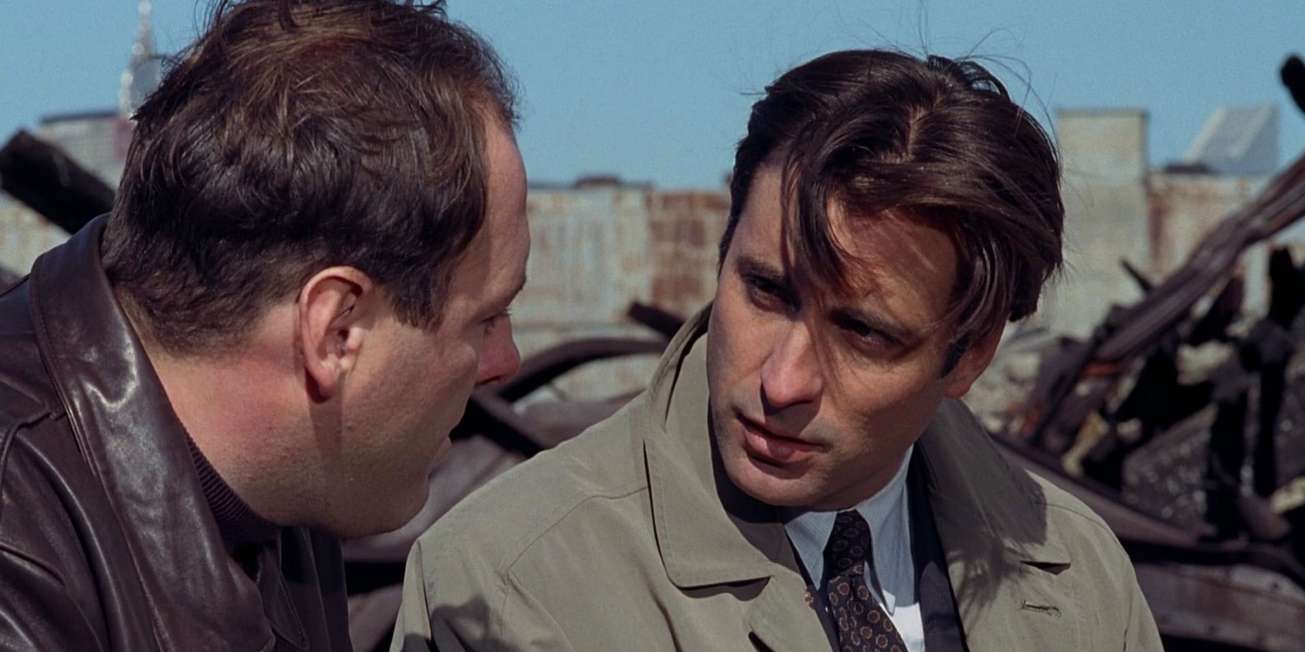 Sean and Joey, played by actors Andy Garcia and James Gandolfini, talk at a junkyard in Night Falls on Manhattan.