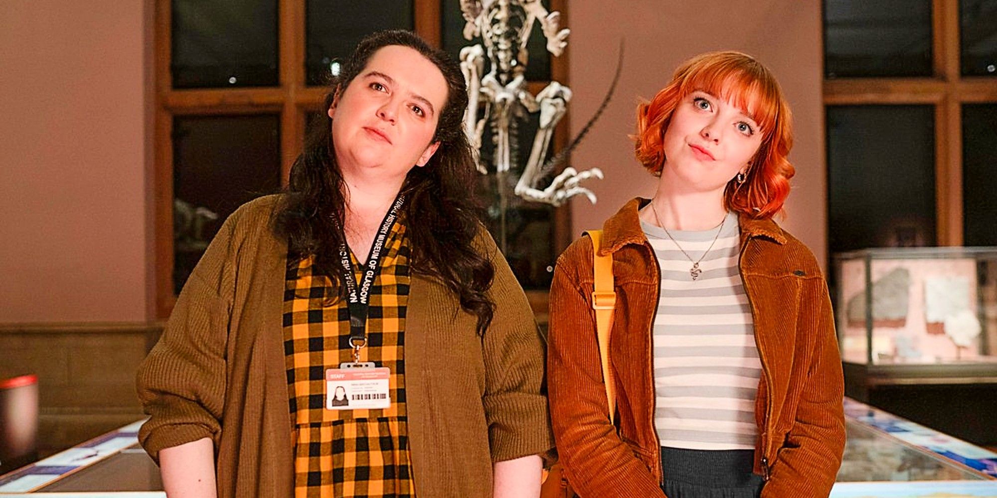 Nina and Evie standing in a museum in Dinosaur
