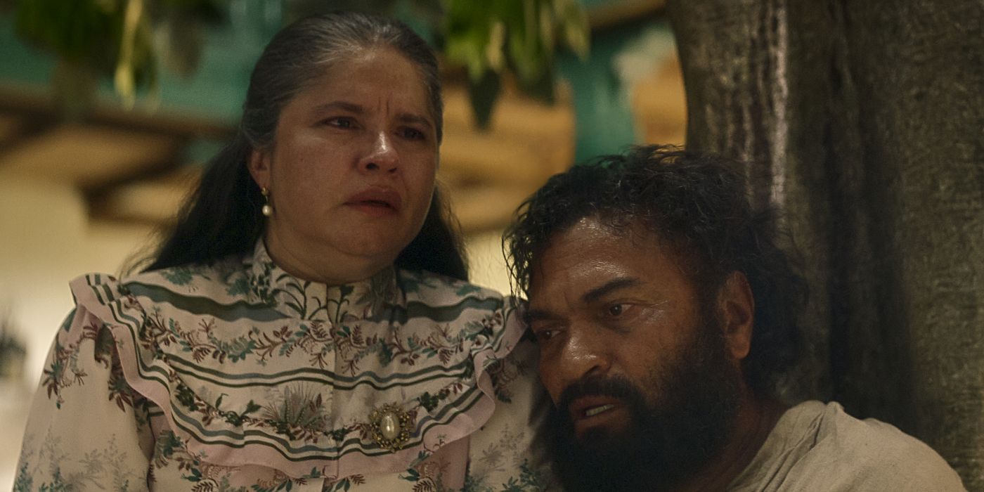 Marleyda Soto sitting on Diego Vasquez's lap looking tearful