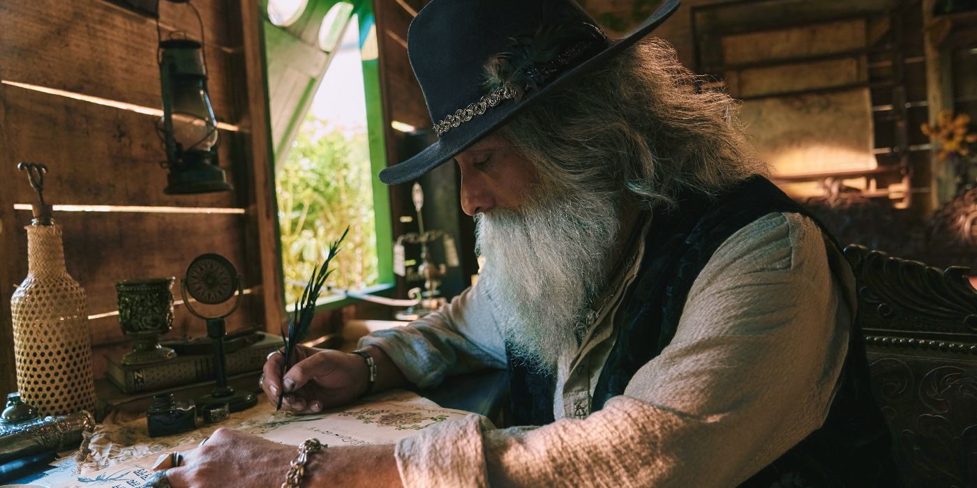 Moreno Borja working on Melquiades' mysterious writings of the Buendia family