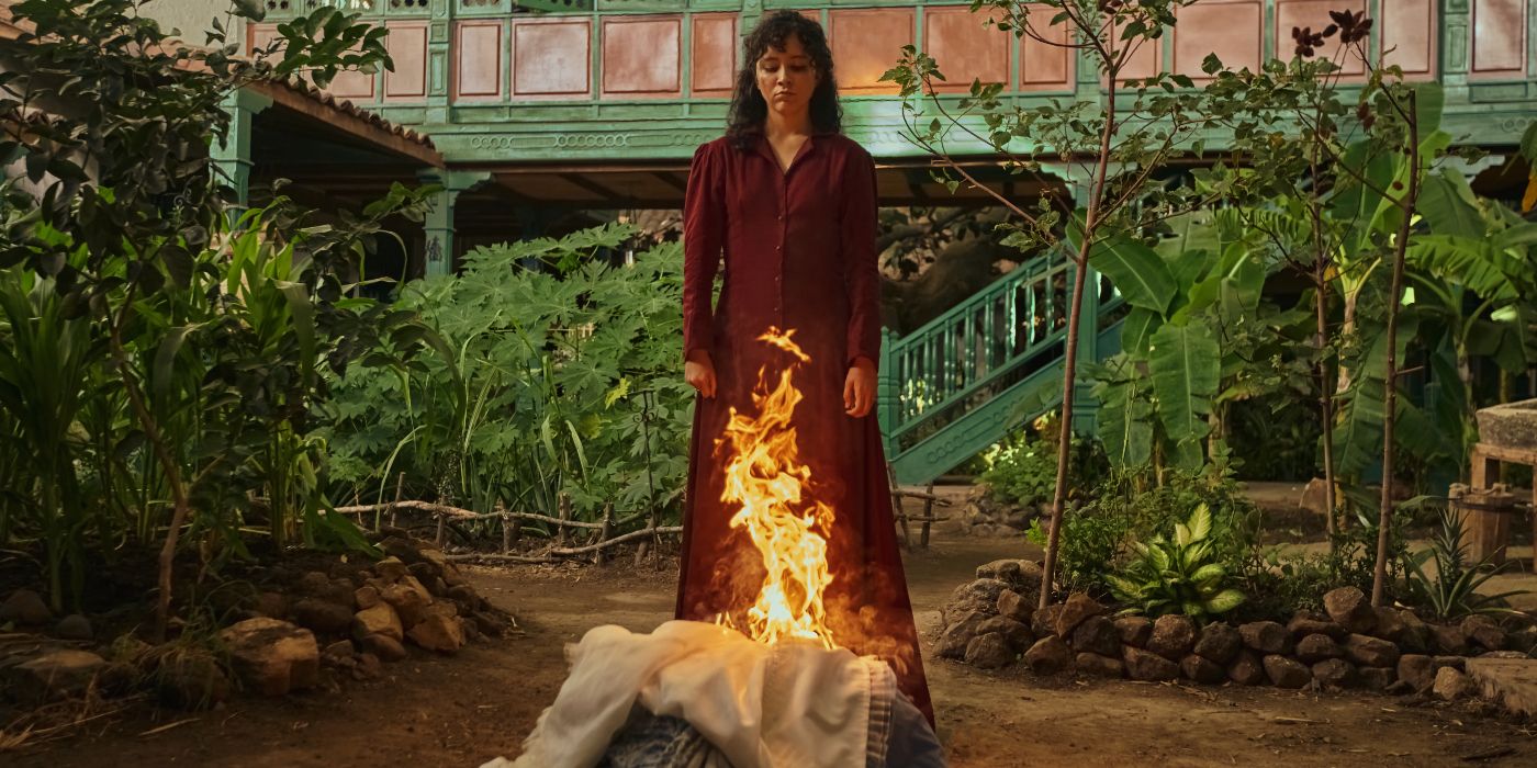 Loren Sofia Paz burning a pile of clothes