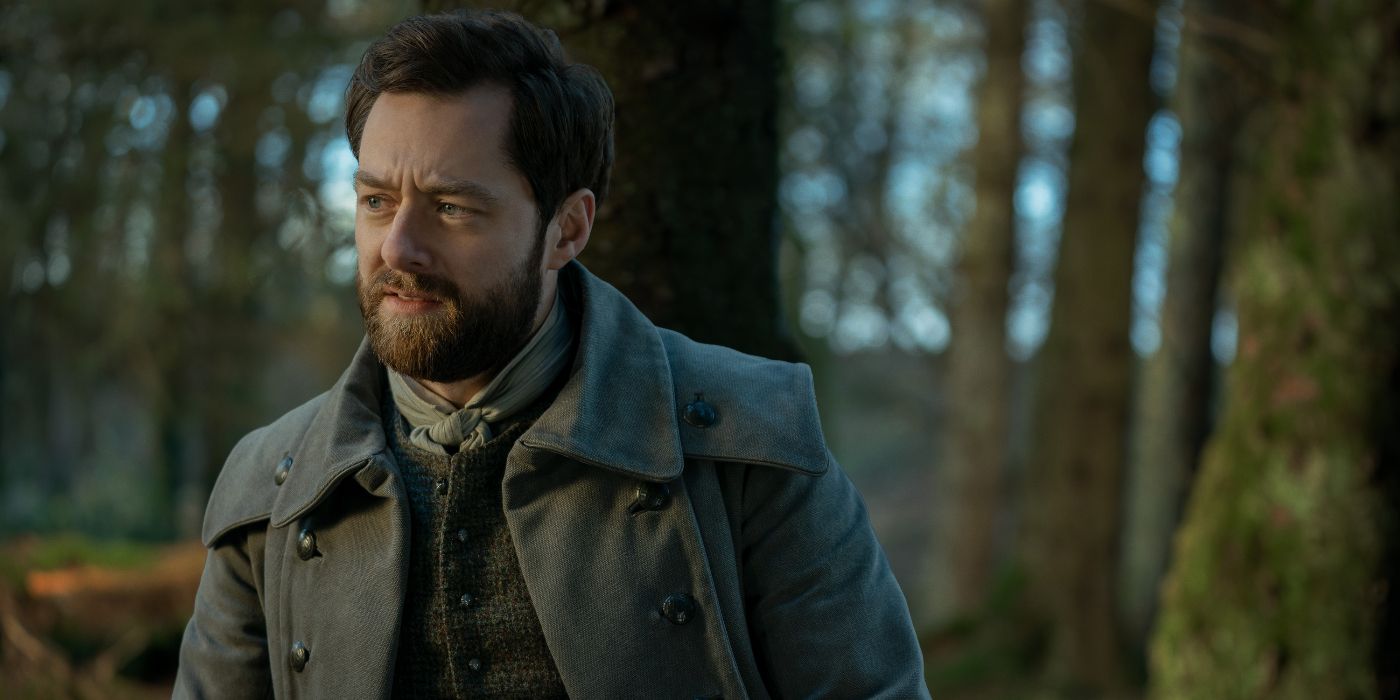 Richard Rankin sitting in the woods