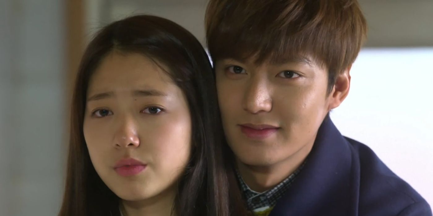 Park Shin-Hye and Lee Min-Ho hold each other and look thoughtful in Heirs.