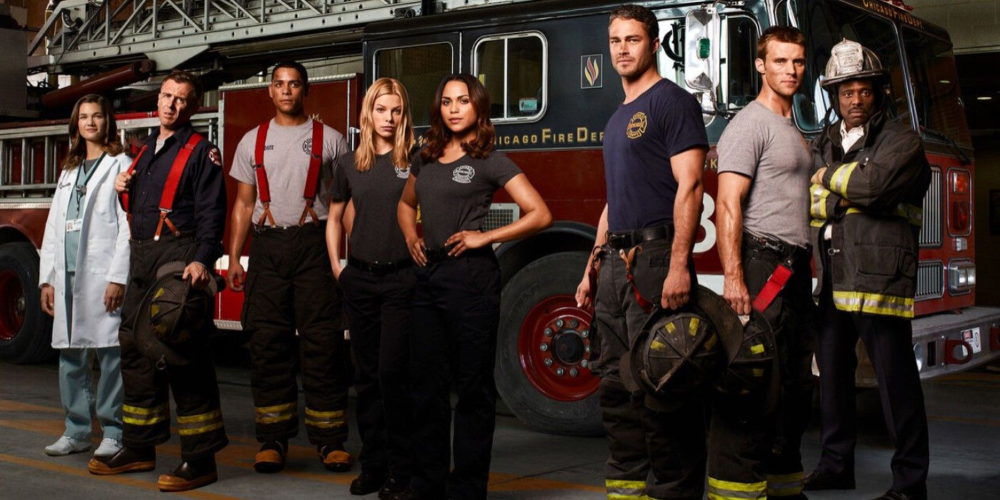 Promotional image featuring Season 1 cast standing by a fire truck in 'Chicago Fire'