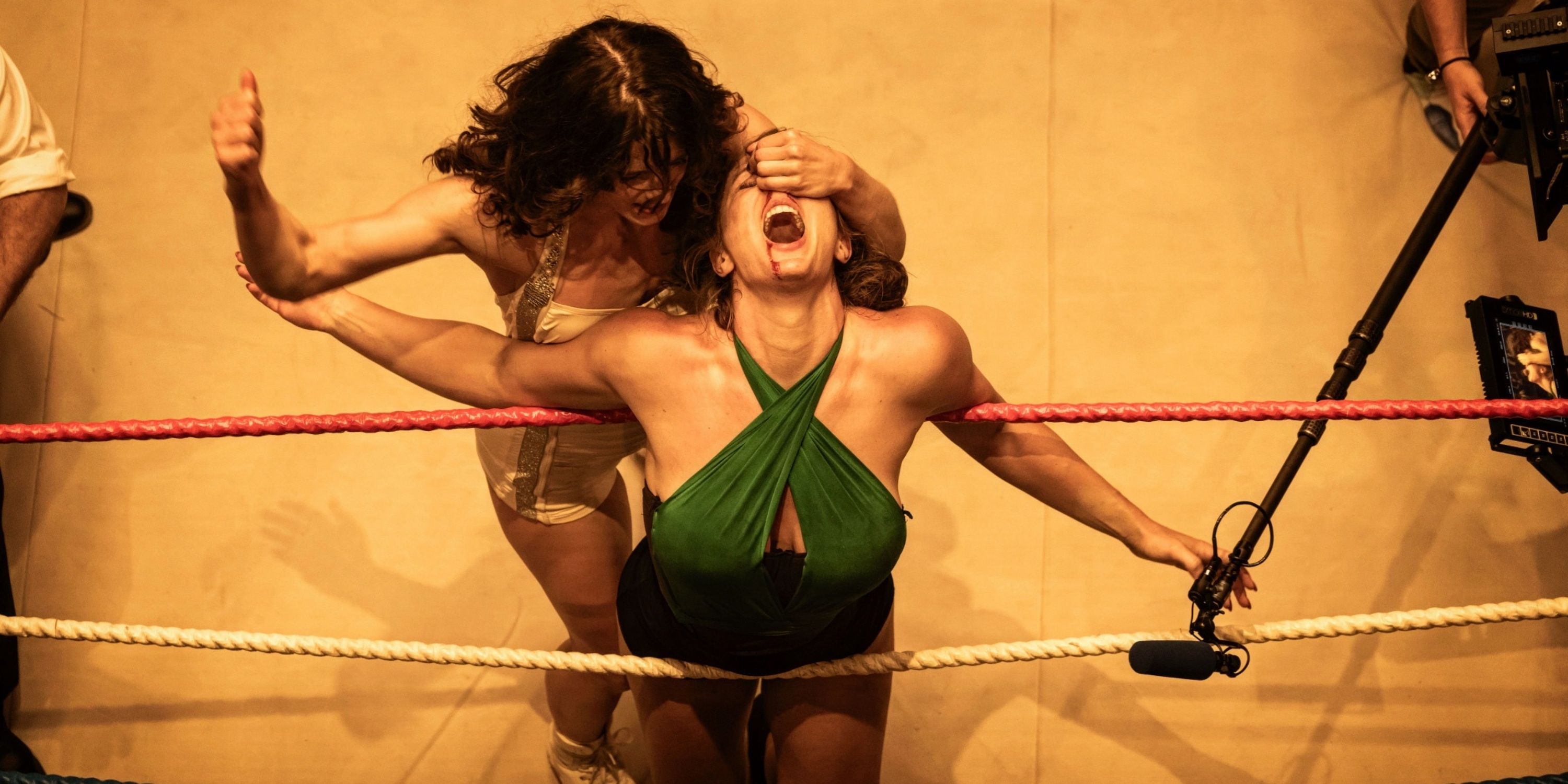 Emily Bett Rickards as Mildred Burke wrestling in the ring with another woman in Queen of the Ring