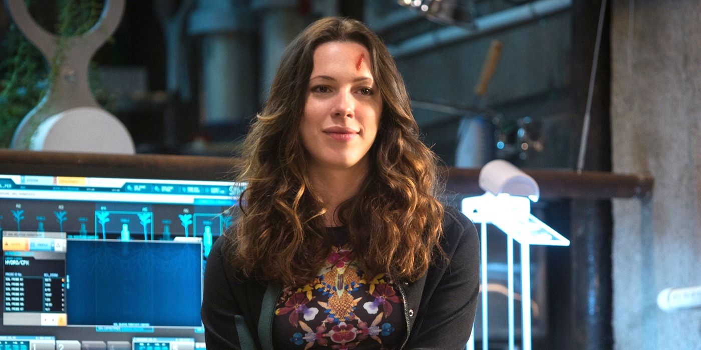 Rebecca Hall as Maya Hansen sitting in front of a computer in 'Iron Man 3'