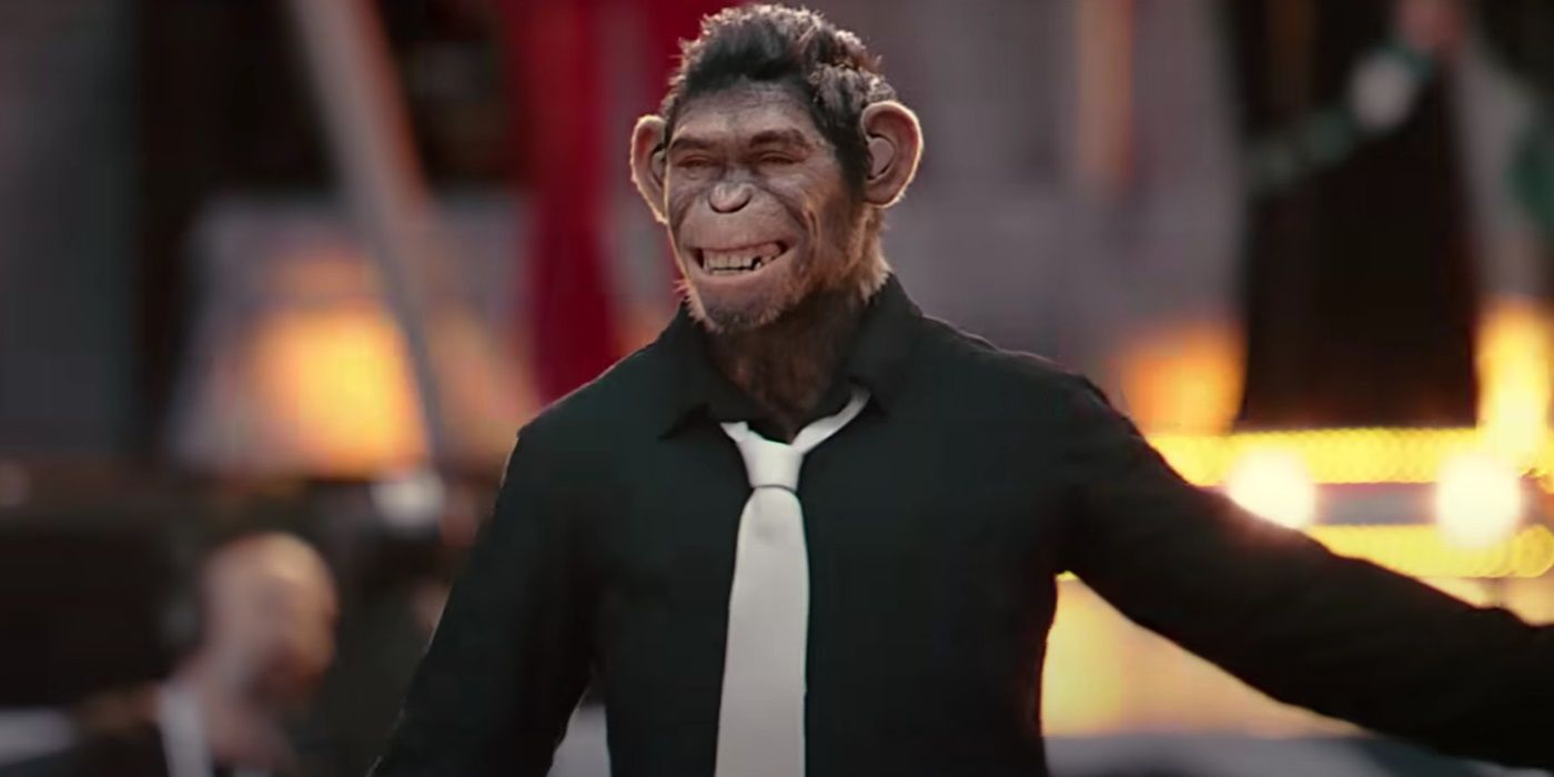 Robbie Williams, smiling at the crowd, as a chimpanzee in Better Man