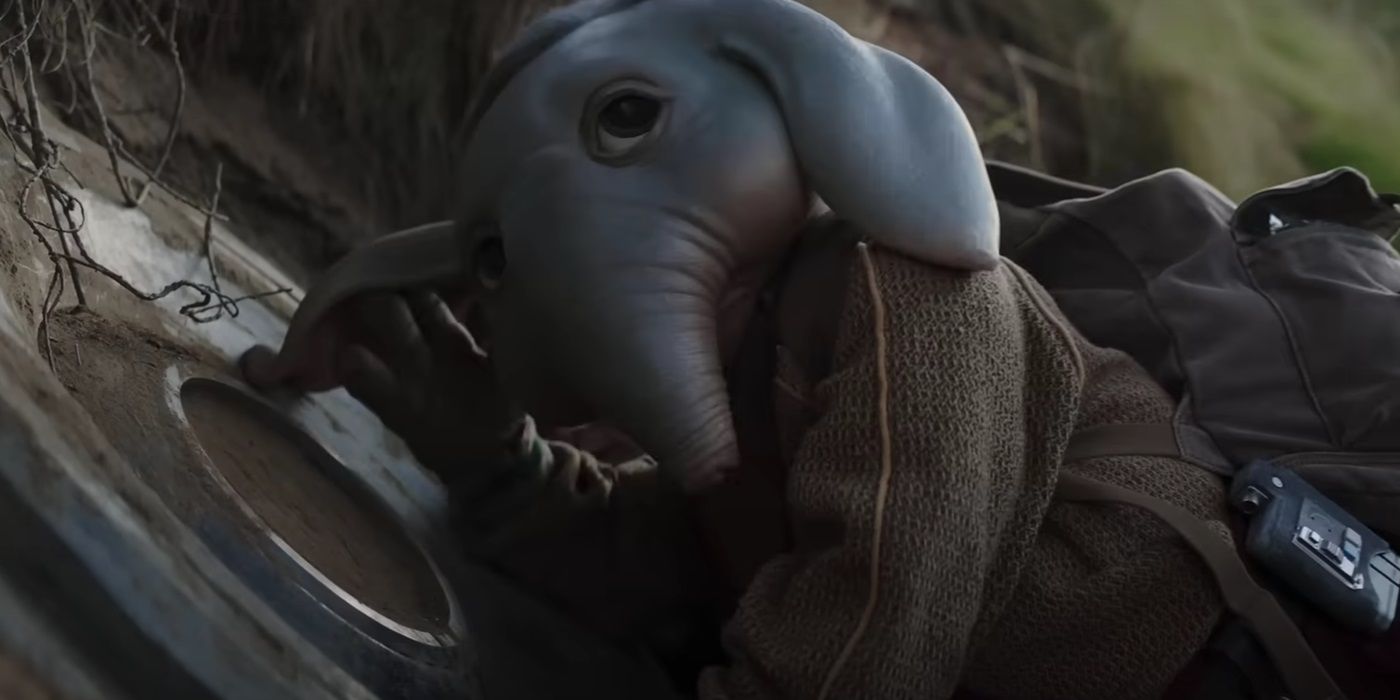 Robert Timothy Smith, leaning onto a starship, as Neel in Star Wars: Skeleton Crew