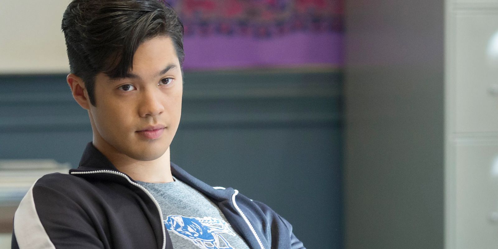 Ross Butler looking intently ahead in 13 Reasons Why