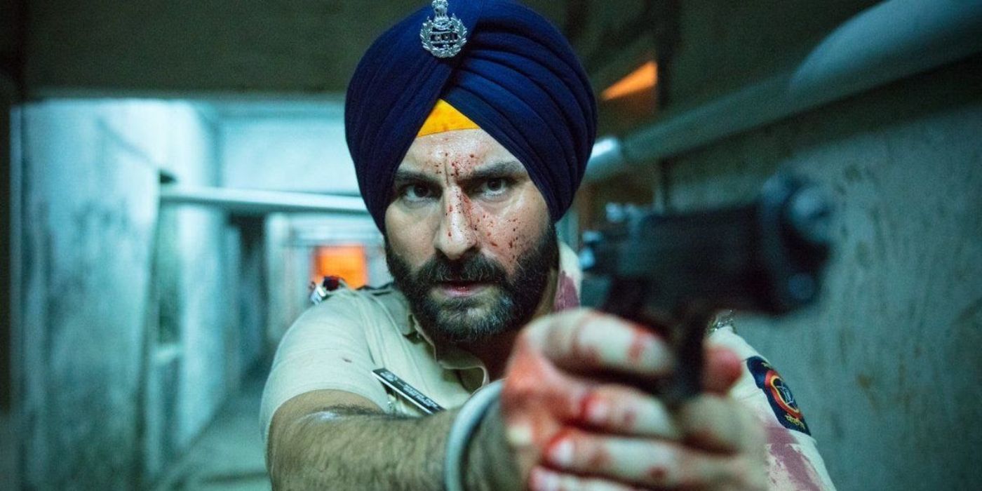 Saif Ali Khan, blood splattered, points a gun off-camera in Sacred Games 2018