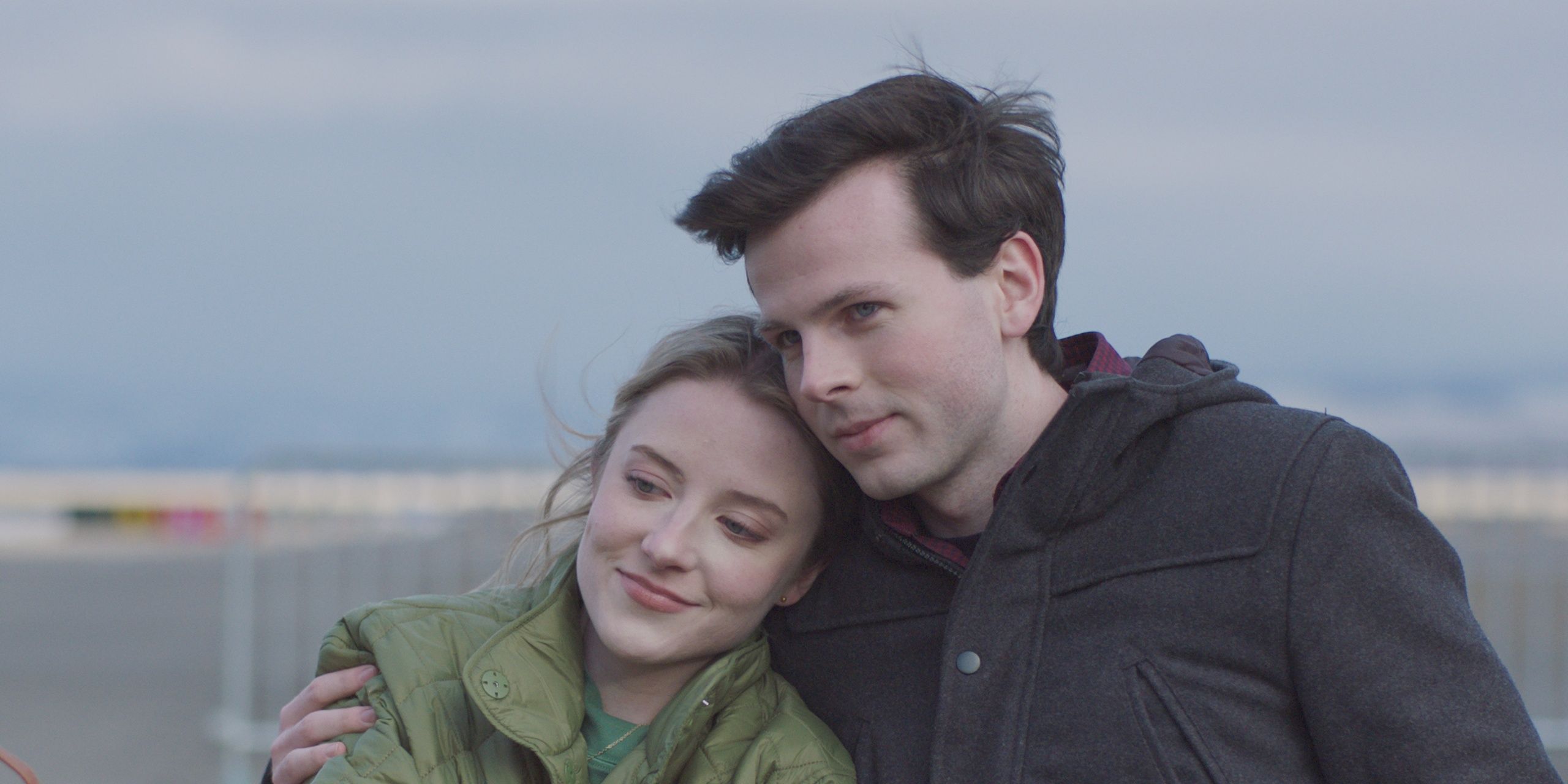 Chandler Riggs as Ben holds Samantha Isler as Cassie in Breakup Season