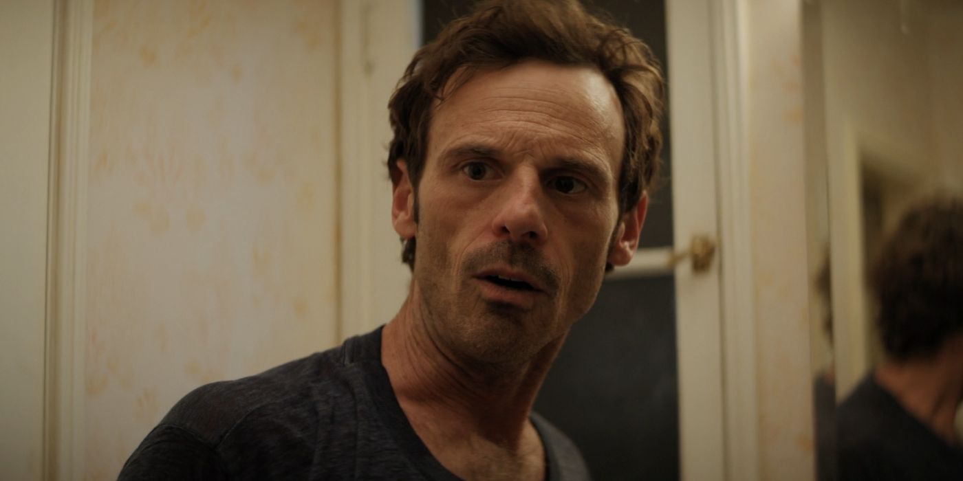 Scoot McNairy looking confused in Nightbitch.