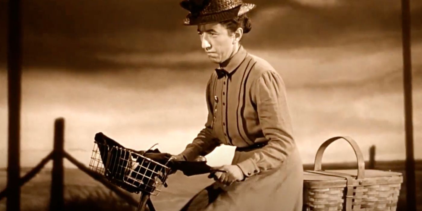 Miss Gulch (Margaret Hamliton) is a cruel woman from Kansas in The Wizard of Oz.