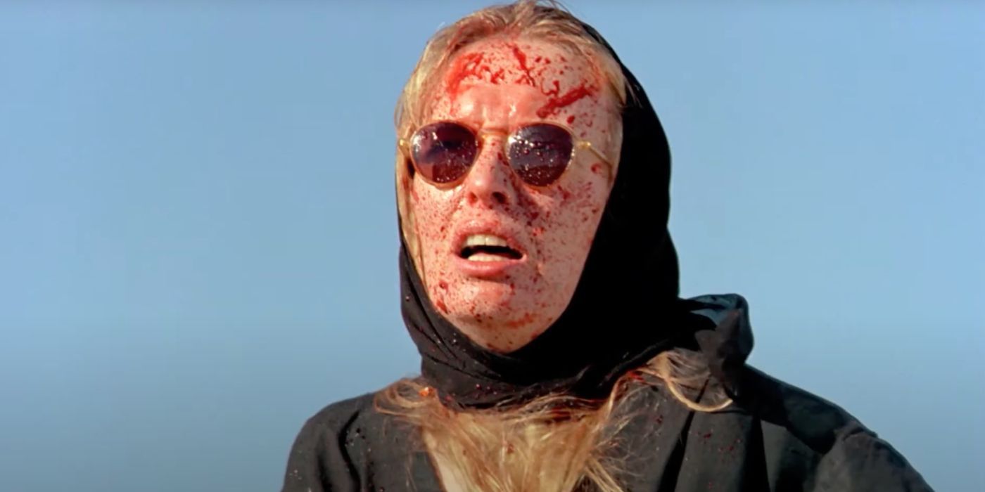 Dolphin Blue (Lindsay Duncan) is shocked as a cruel prank sprays her with blood in The Reflecting Skin.