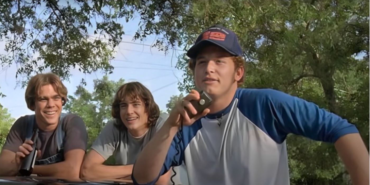 Cole Hauser as Benny wearing a baseball cap holding a mic in 'Dazed and Confused'