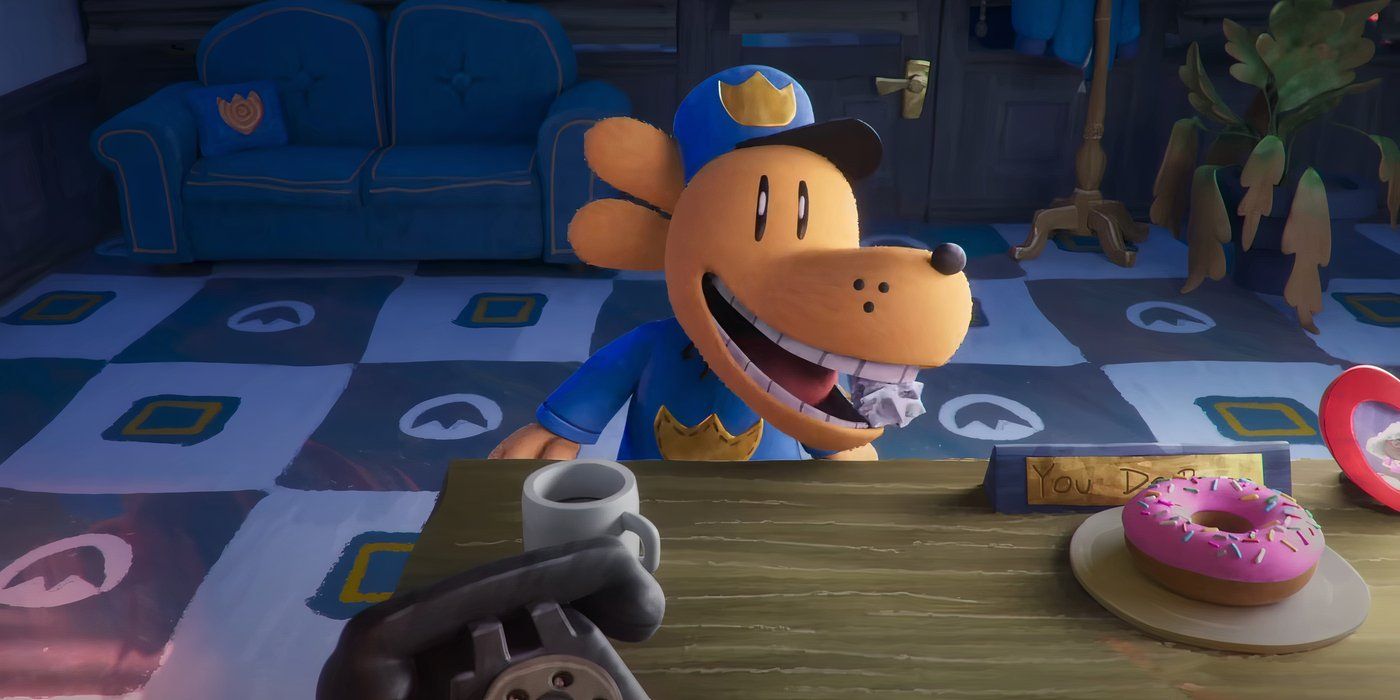 Dog Man holding a crumpled piece of paper in &lsquo;Dog Man&rsquo;