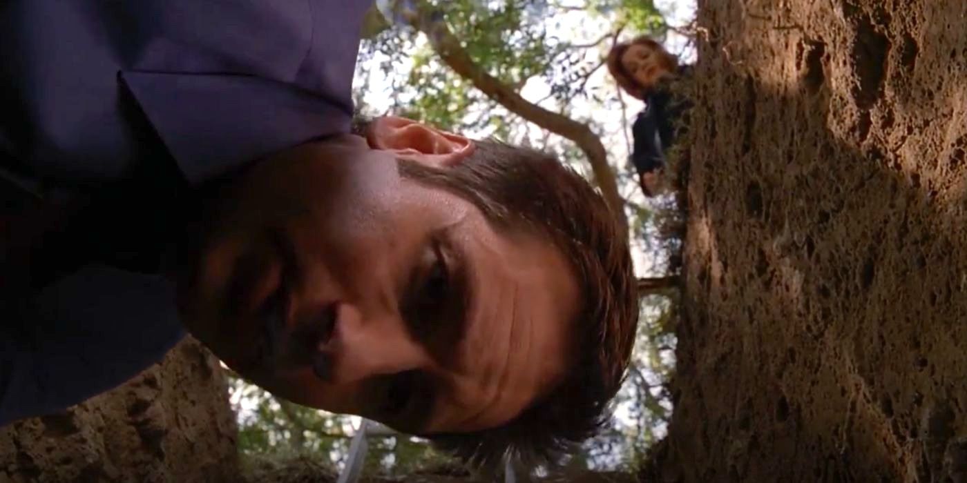 FBI agents Mulder (David Duchovny) and Scully (Gillian Anderson) investigate a grave robbery in The X-Files episode &ldquo;Millennium.&quot;
