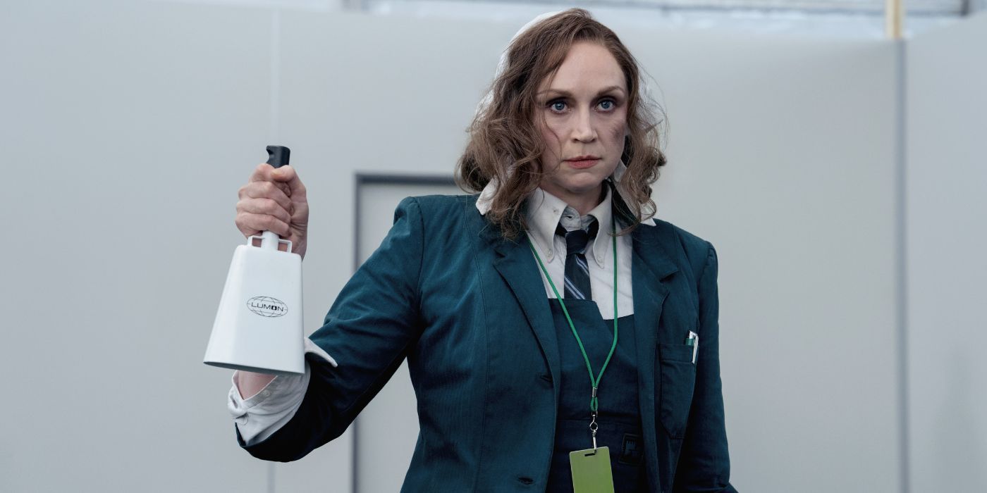 Gwendoline Christie holding a cowbell in Severance Season 2.