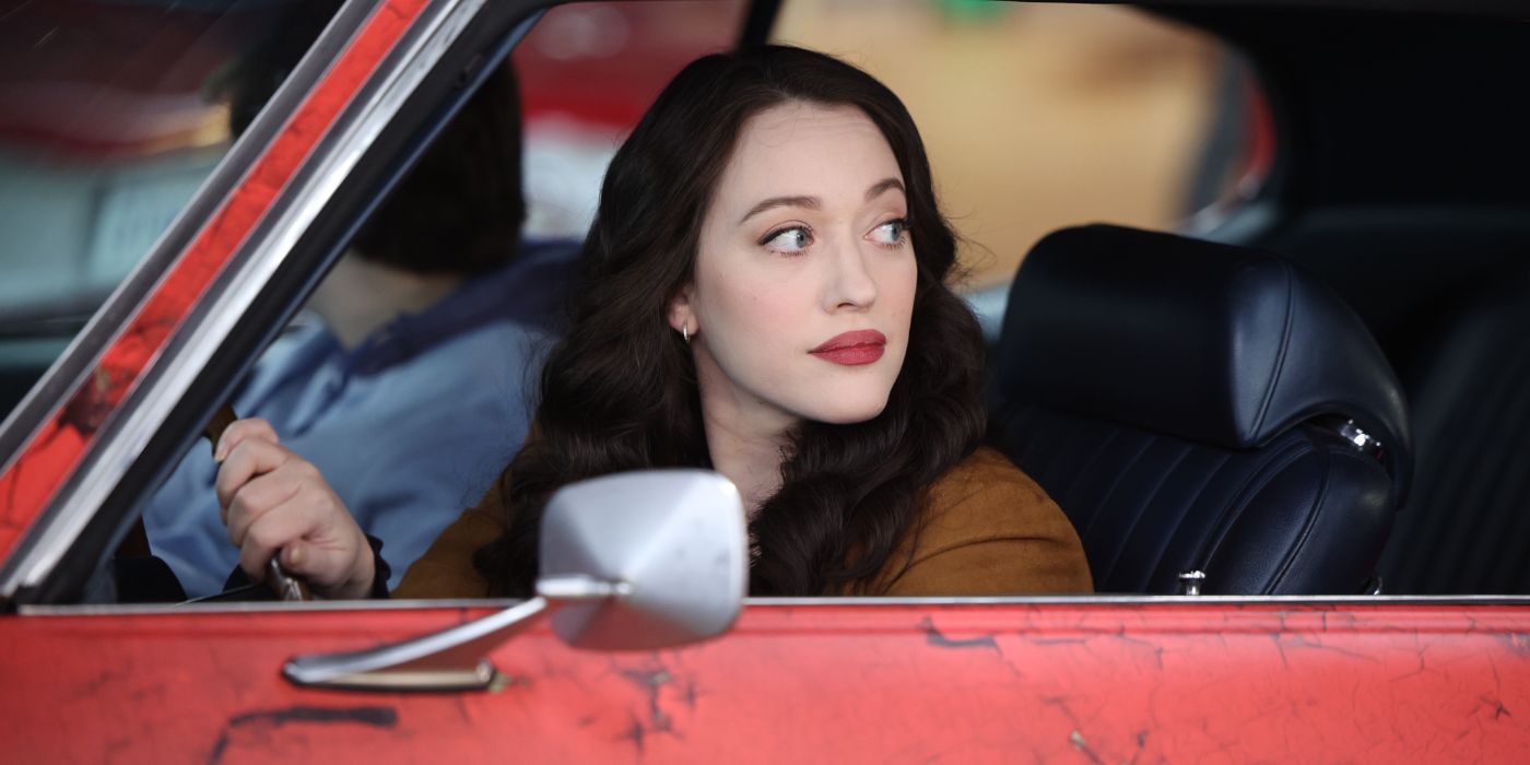 Kat Dennings as Riley looking back from the driver's seat of a car in Shifting Gears