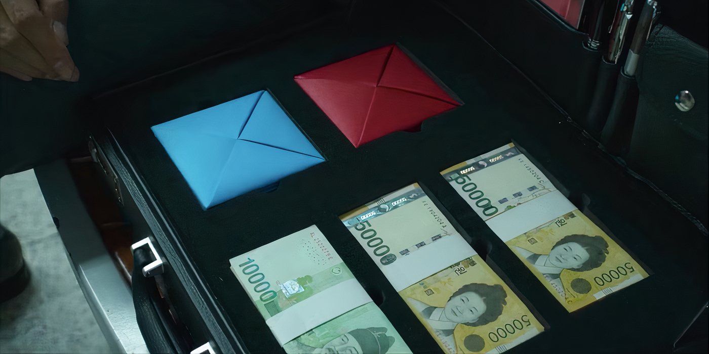 Red and blue paper envelopes and money in a brief case