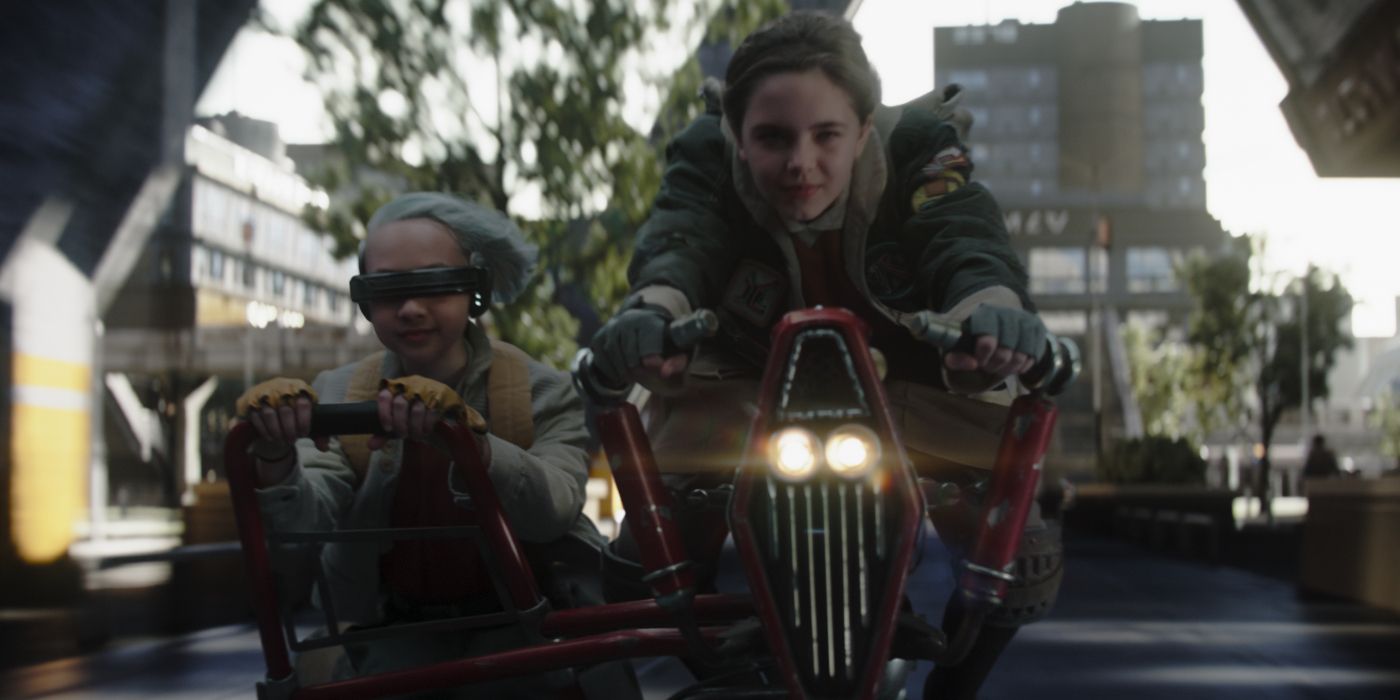 Ryan Kiera Armstrong and Kyriana Kratter on a hoverbike in Skeleton Crew Episode 1