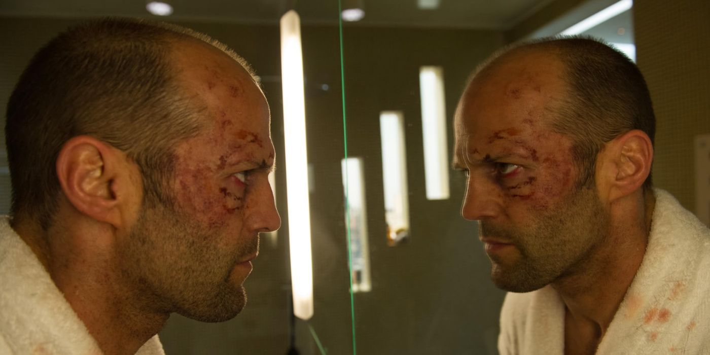 Jason Statham has a bloody face and stares into a mirror in &lsquo;Redemption&rsquo;
