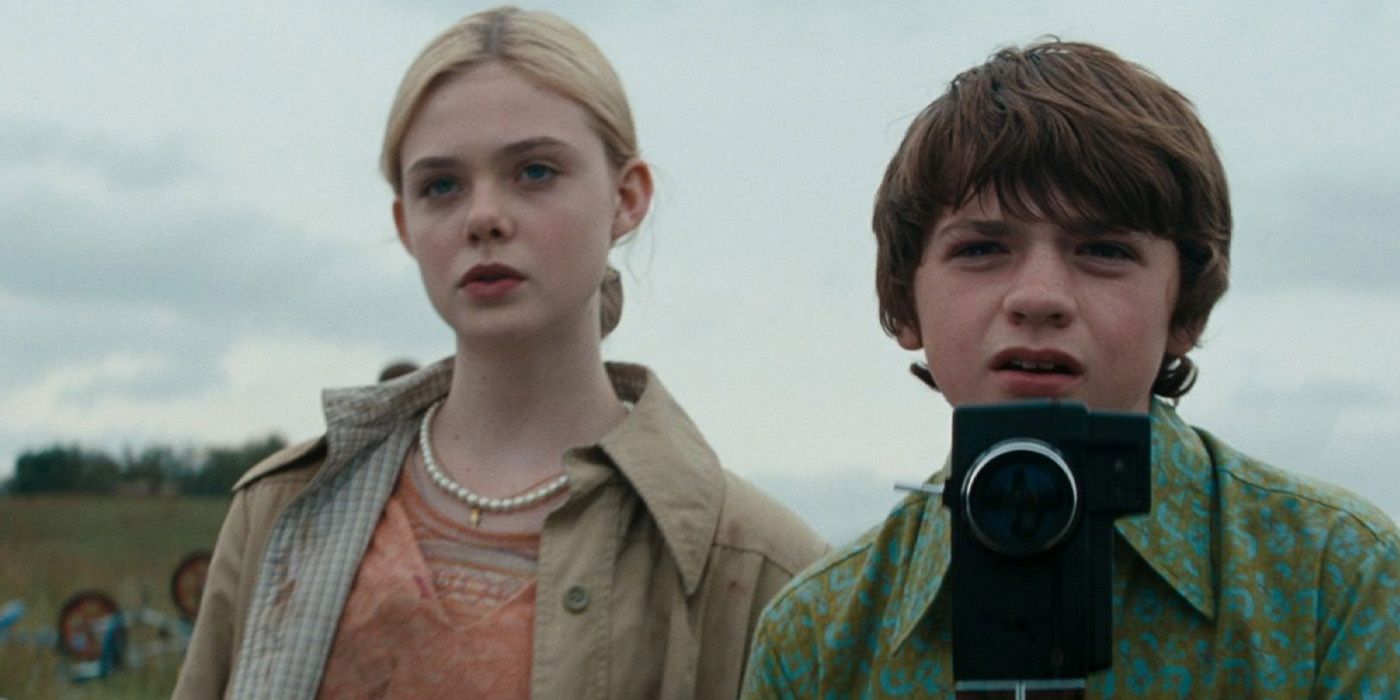 Alice Dainard (Elle Fanning) and Joe Lamb (Joel Courtney) behind a camera in &lsquo;Super 8&rsquo;