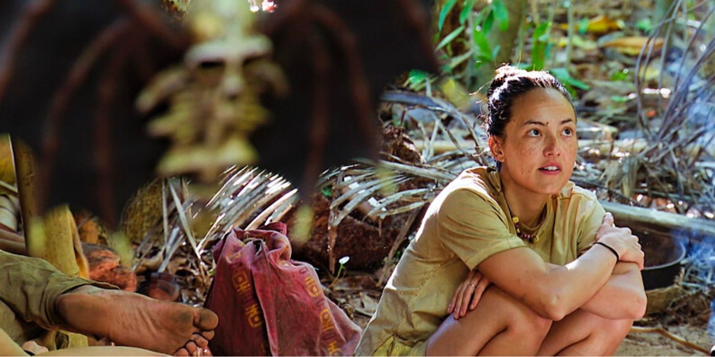 Rachel sits in camp with the Immunity Necklace looming on 'Survivor 47.'