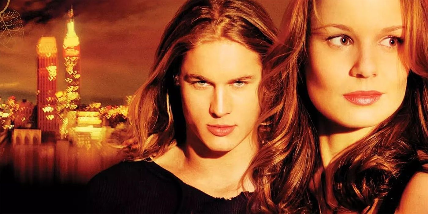 Travis Fimmel and Sarah Waynne Callies in front of a city backdrop for Tarzan