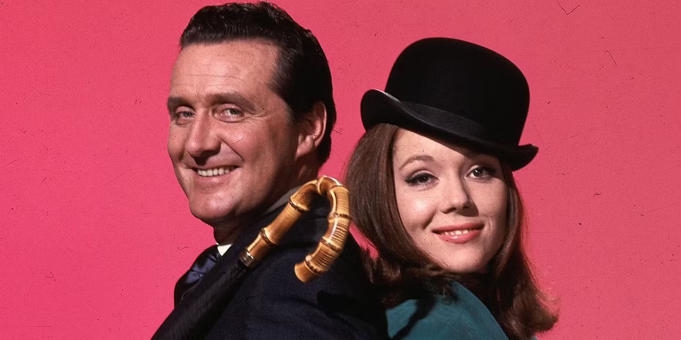 Mrs. Peel and Agent John Steed smile at the camera in The Avengers