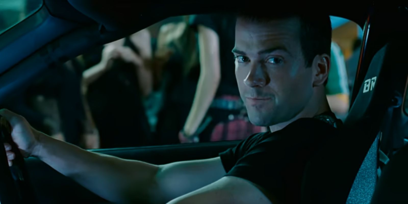 Sean Boswell, played by Lucas Black, sits in the driver's seat of his car in 'The Fast and the Furious: Tokyo Drift'.