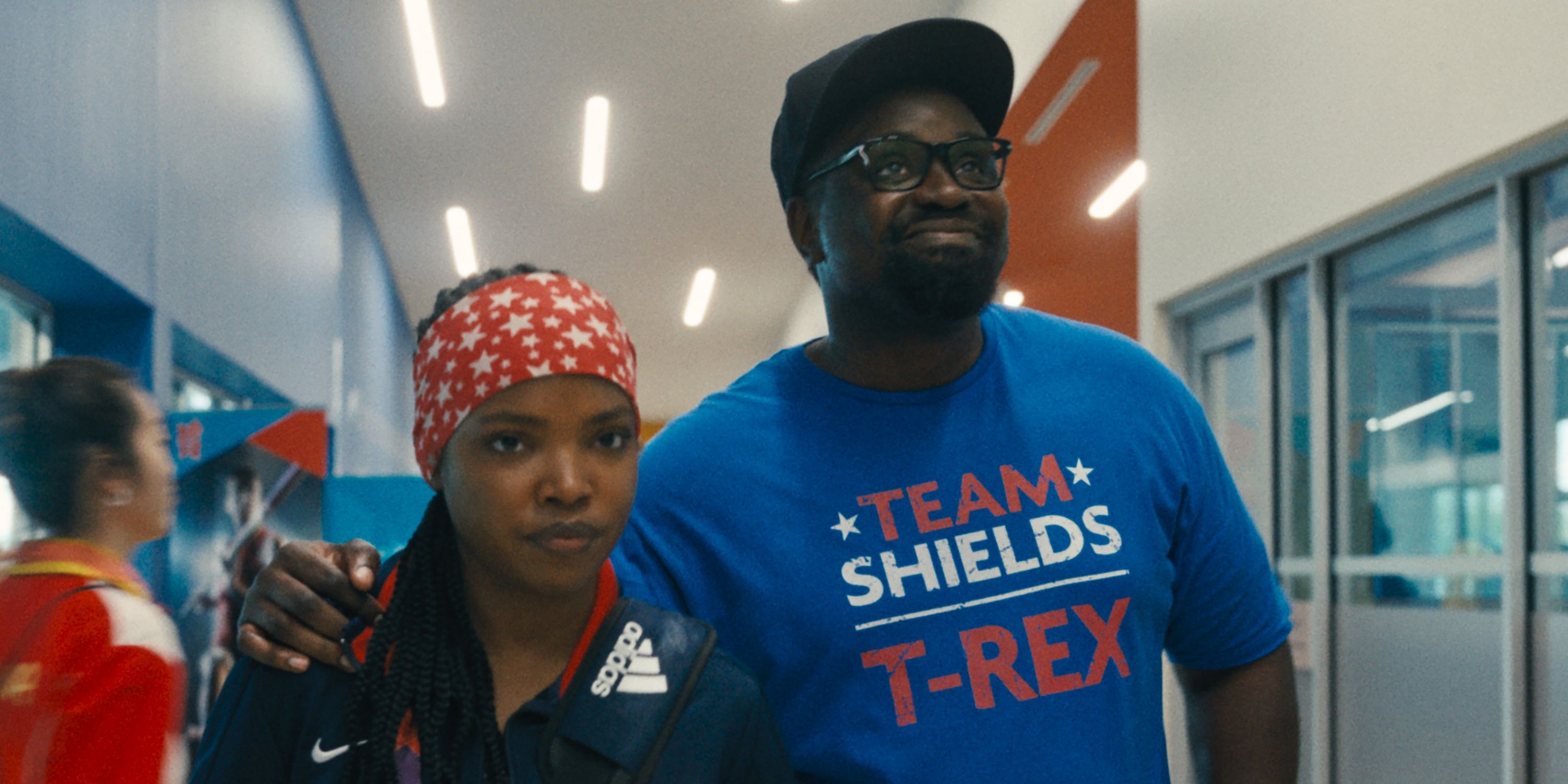 Ryan Destiny as boxer Claressa Shields walking with Brian Tyree Henry as her coach in The Fire Inside